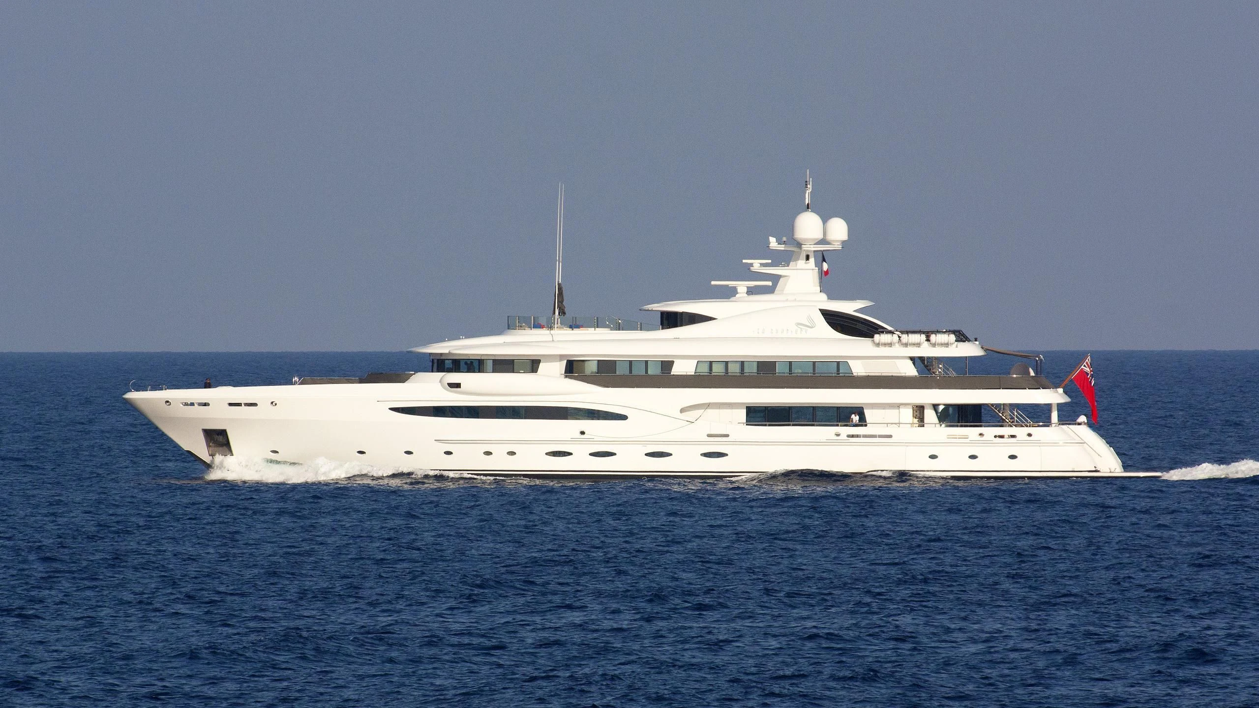 a large white yacht aboard SEA RHAPSODY Yacht for Sale