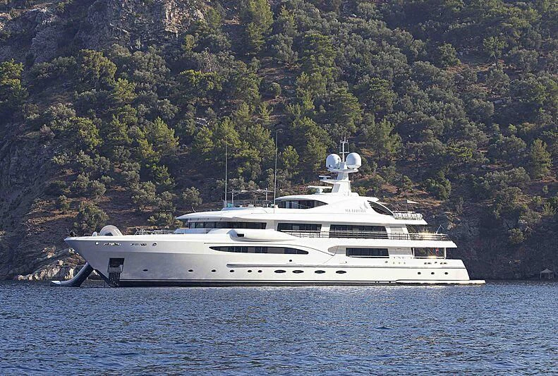 a white yacht on the water aboard SEA RHAPSODY Yacht for Sale
