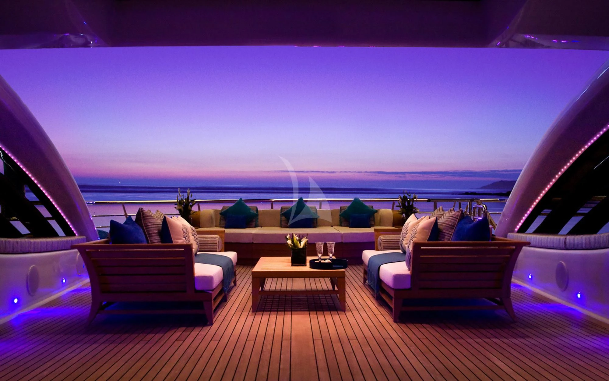 a room with a table and chairs aboard SEA RHAPSODY Yacht for Sale