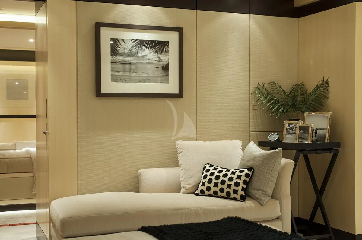 a white couch in a room aboard SEA RHAPSODY Yacht for Sale