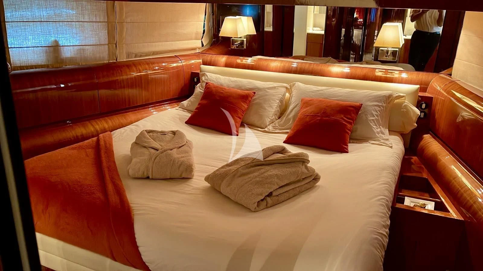 a bed with pillows on it aboard NOTORIOUS Yacht for Sale