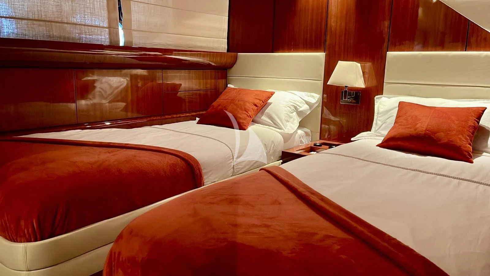 a couple of beds in a hotel room aboard NOTORIOUS Yacht for Sale