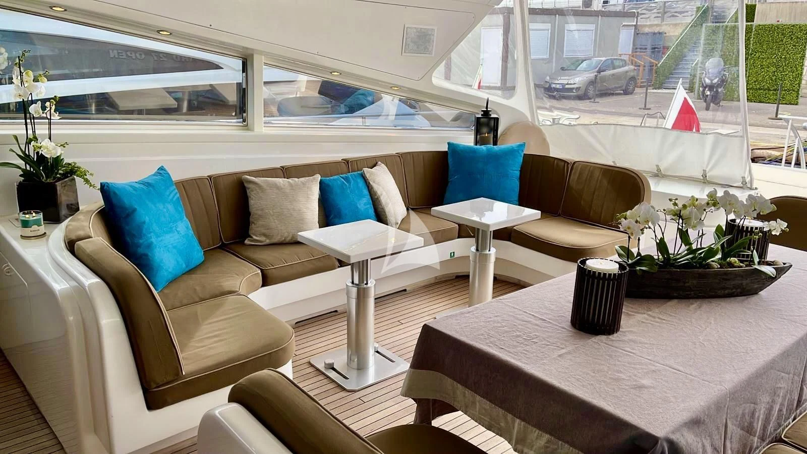 a living room with a couch and a table aboard NOTORIOUS Yacht for Sale