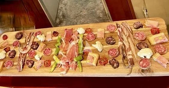 a tray of food aboard NOTORIOUS Yacht for Sale