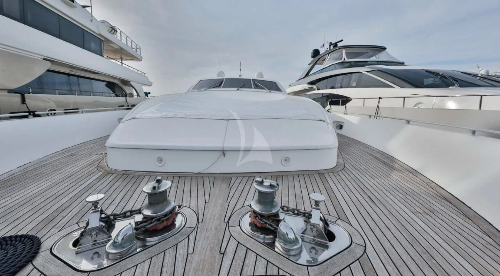 a white boat on a deck aboard NOTORIOUS Yacht for Sale