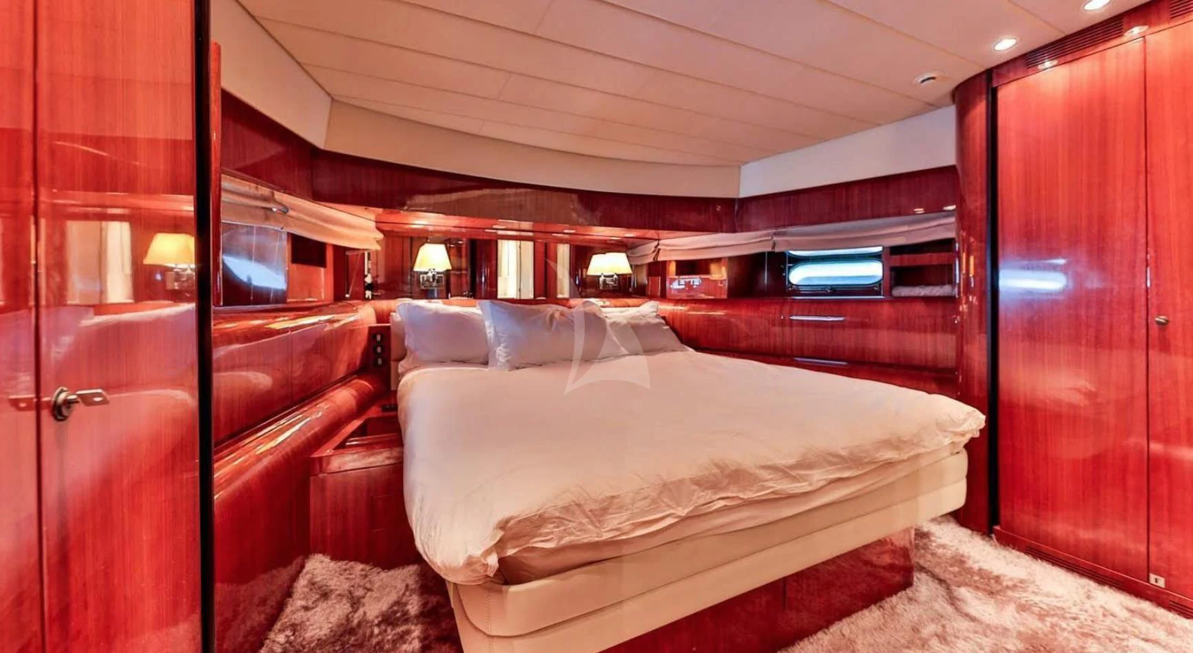 a bed in a room aboard NOTORIOUS Yacht for Sale