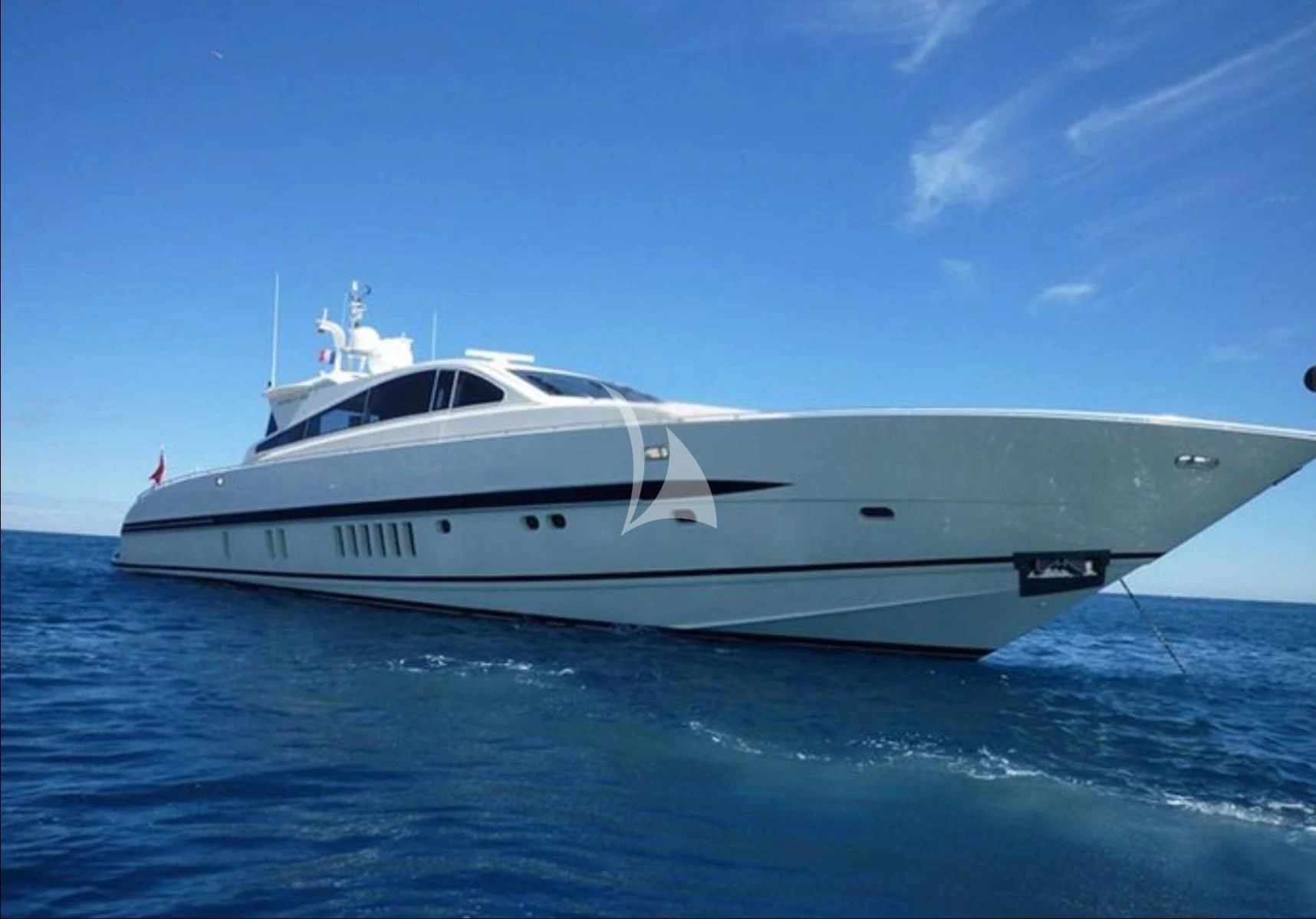 a white yacht in the water aboard NOTORIOUS Yacht for Sale