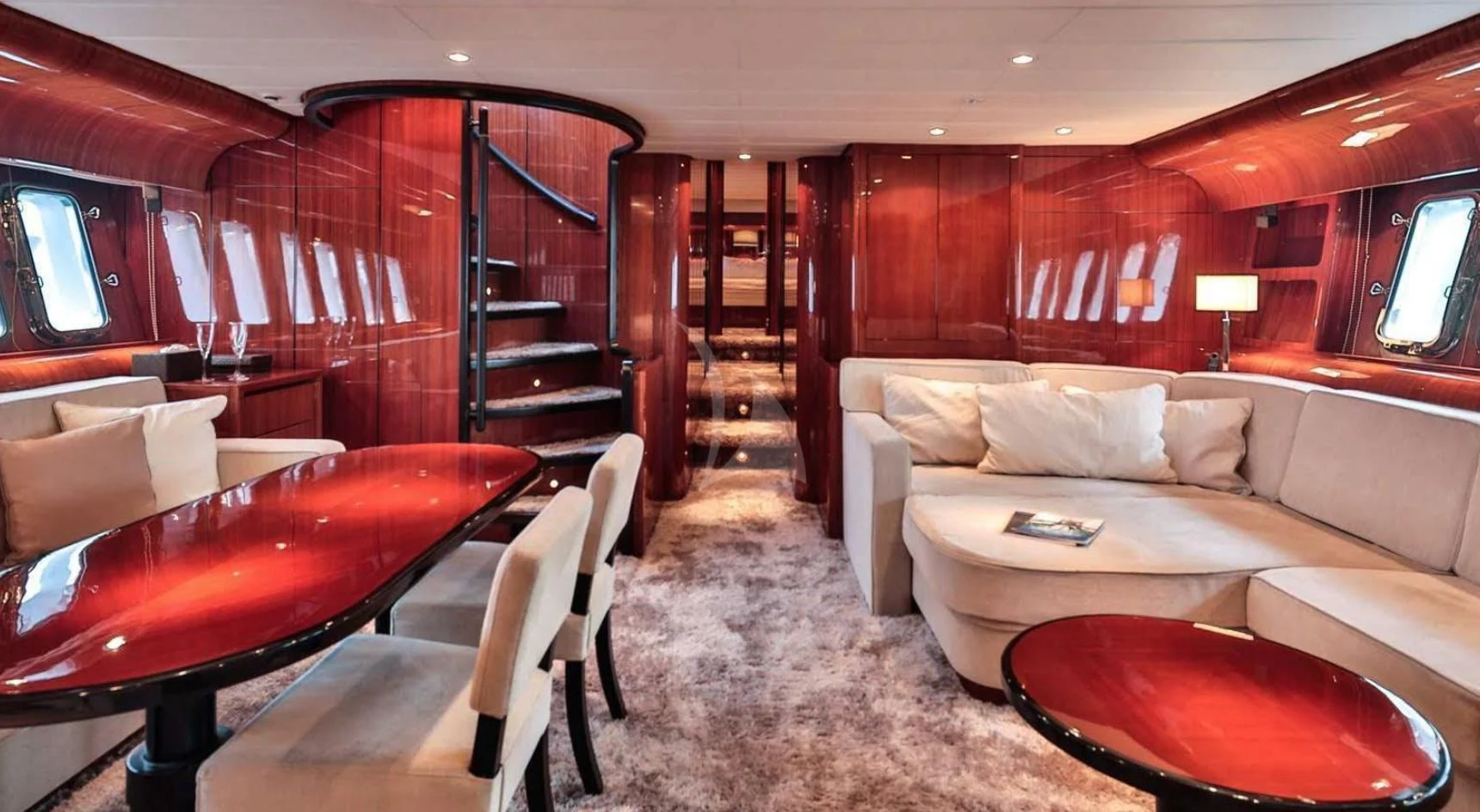 a living room with a couch and a table aboard NOTORIOUS Yacht for Sale