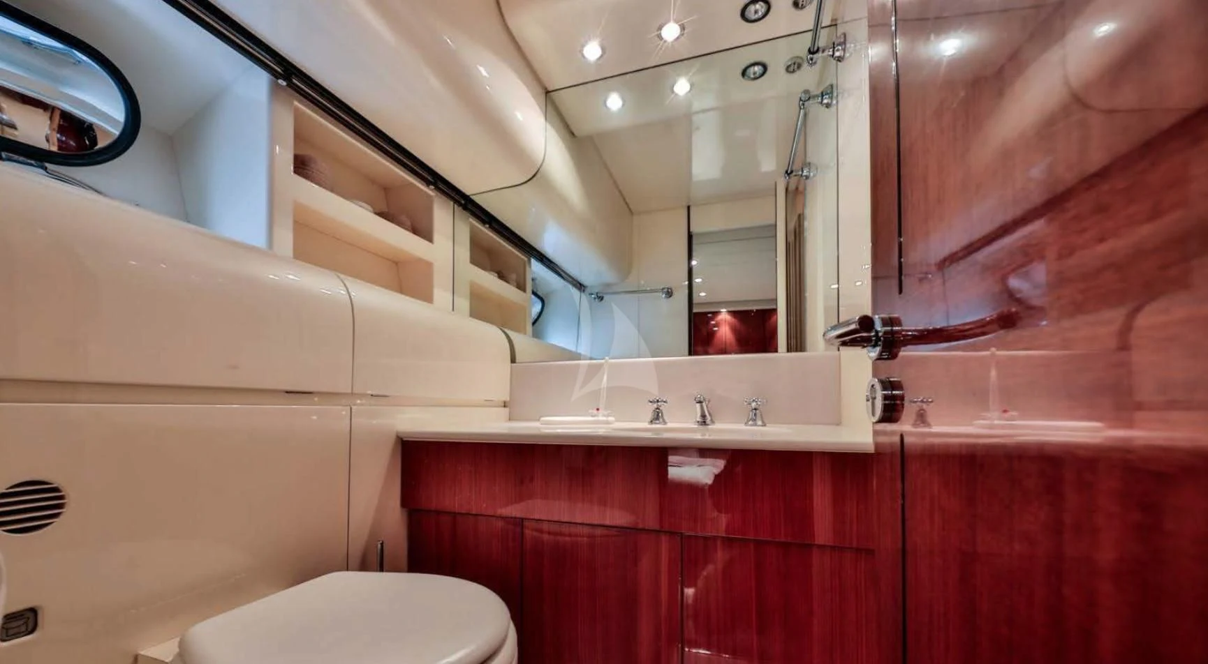 a bathroom with pink cabinets aboard NOTORIOUS Yacht for Sale
