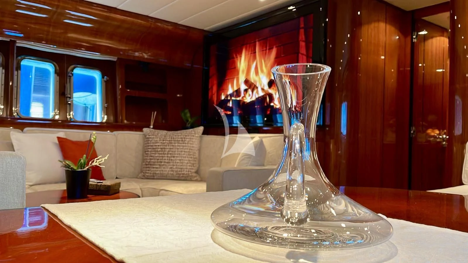 a glass vase on a table aboard NOTORIOUS Yacht for Sale