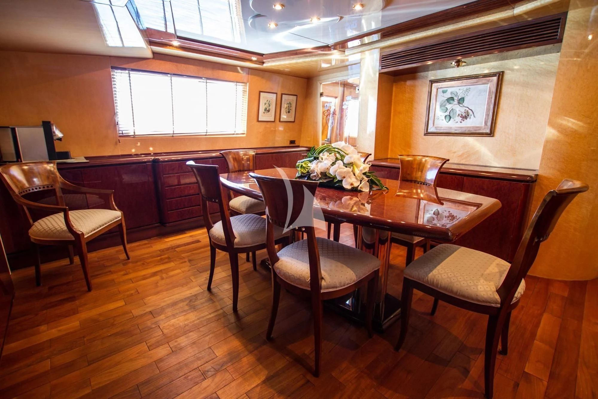 a dining room with a table and chairs aboard MISS CANDY Yacht for Charter