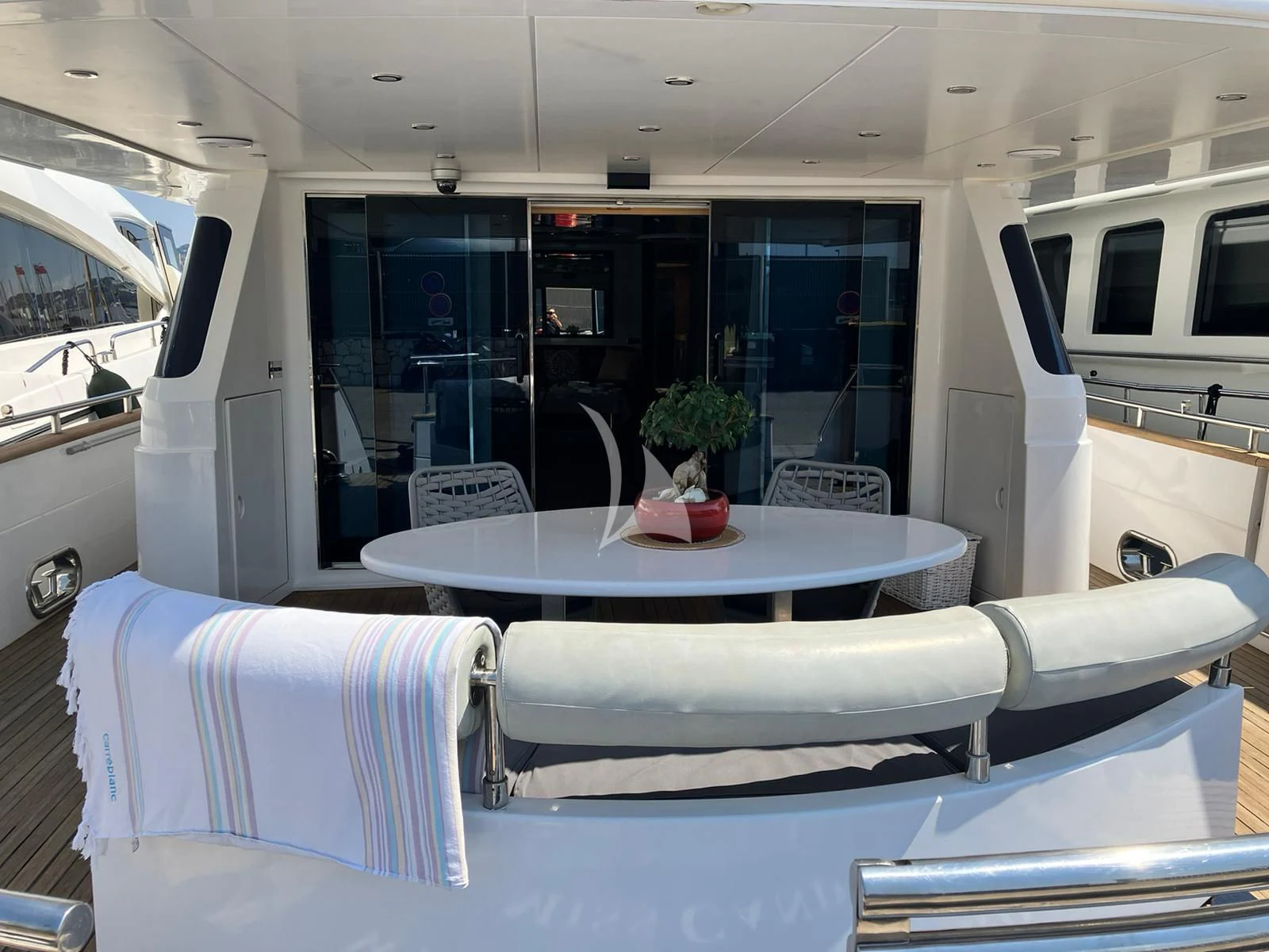 a room with a table and chairs aboard MISS CANDY Yacht for Charter