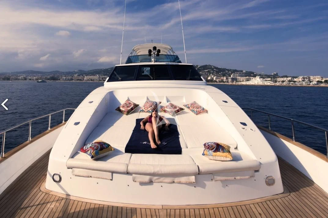 a boat with a person on it aboard MISS CANDY Yacht for Charter