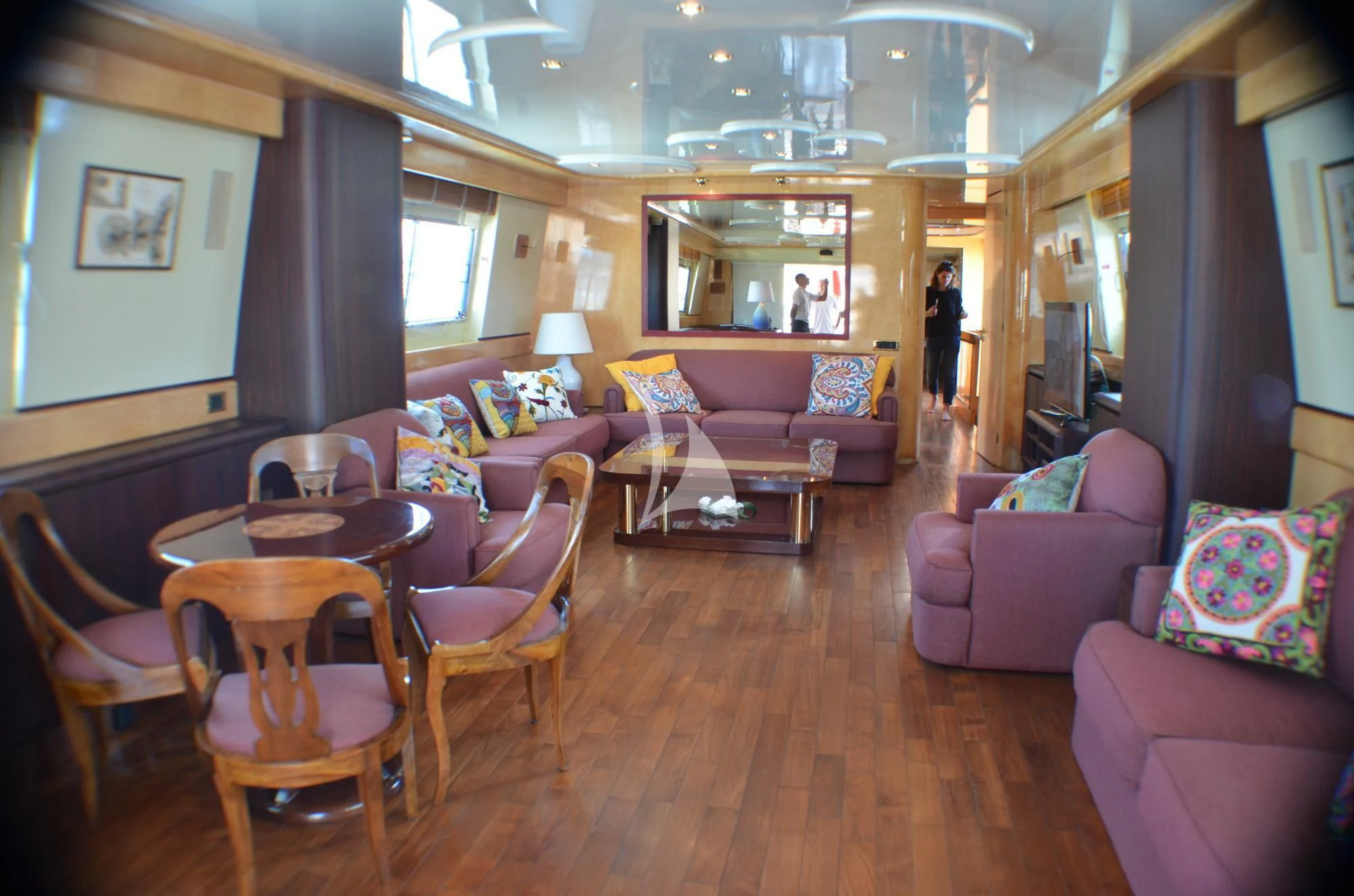 a living room with a wood floor aboard MISS CANDY Yacht for Charter