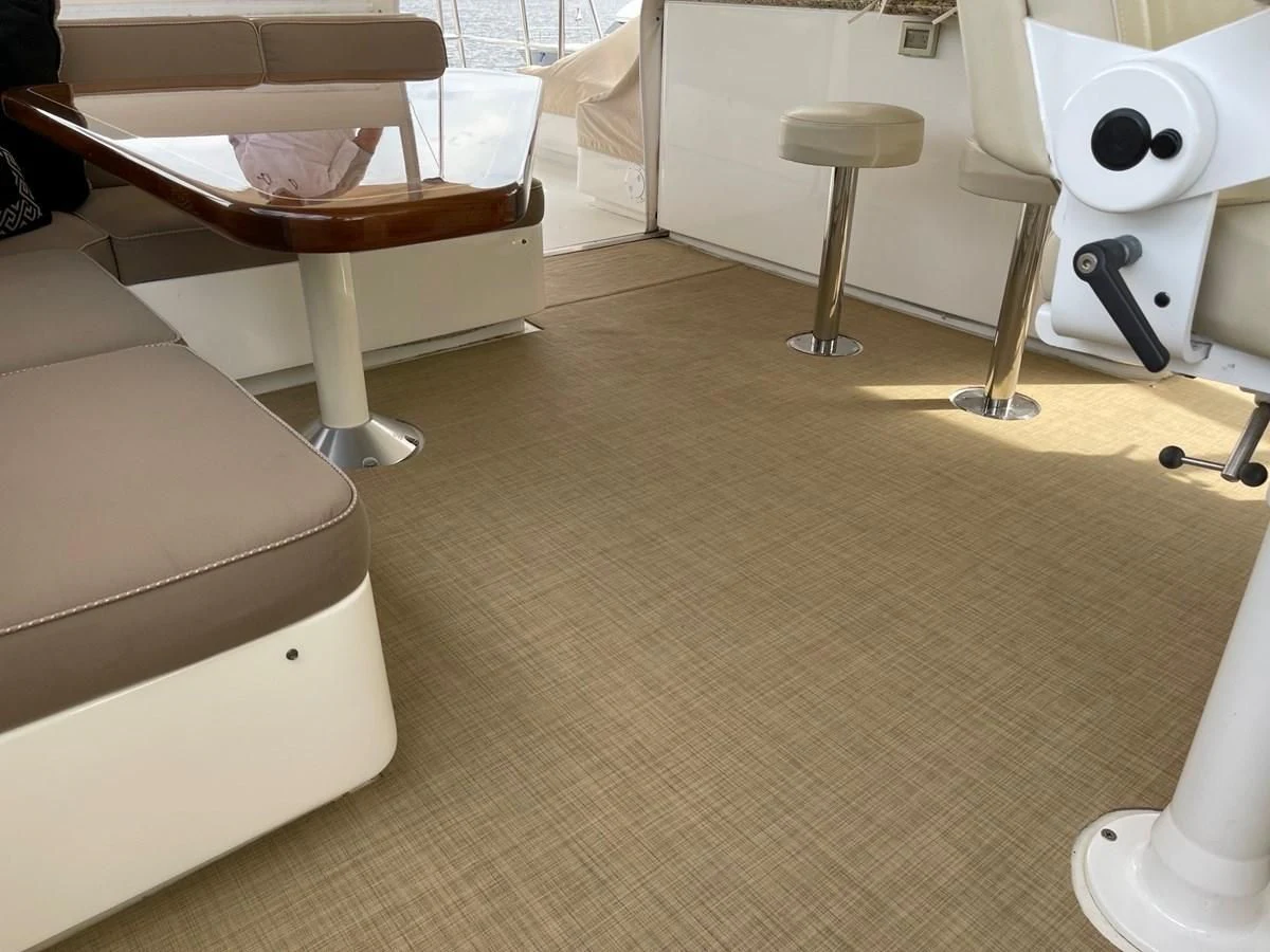 a room with a couch and a chair aboard HARBOR LADY Yacht for Sale