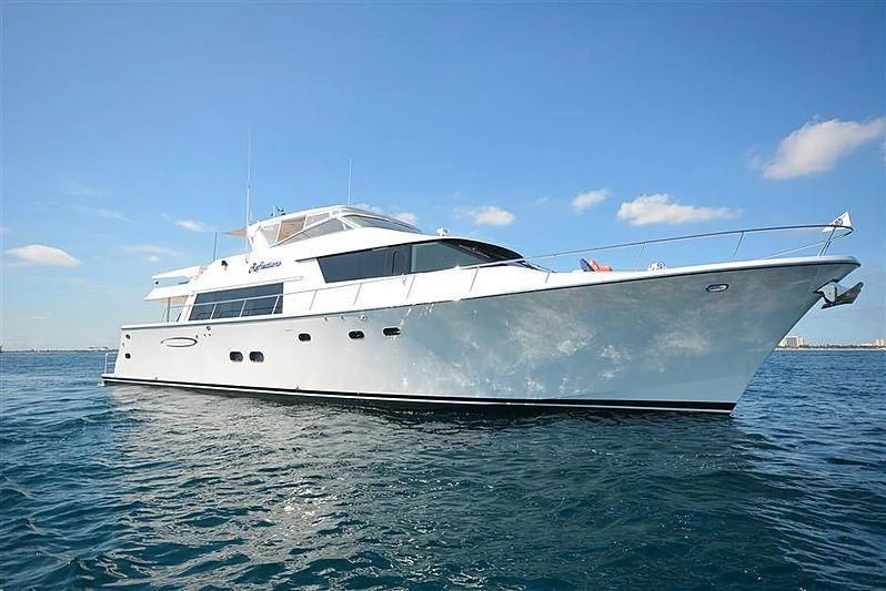 a white yacht in the water aboard HARBOR LADY Yacht for Sale