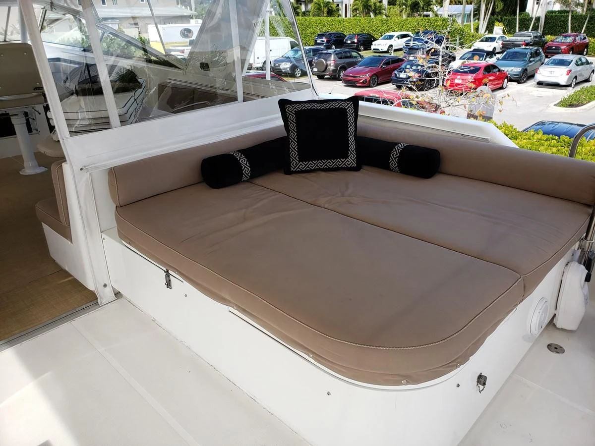 a laptop on a window sill aboard HARBOR LADY Yacht for Sale
