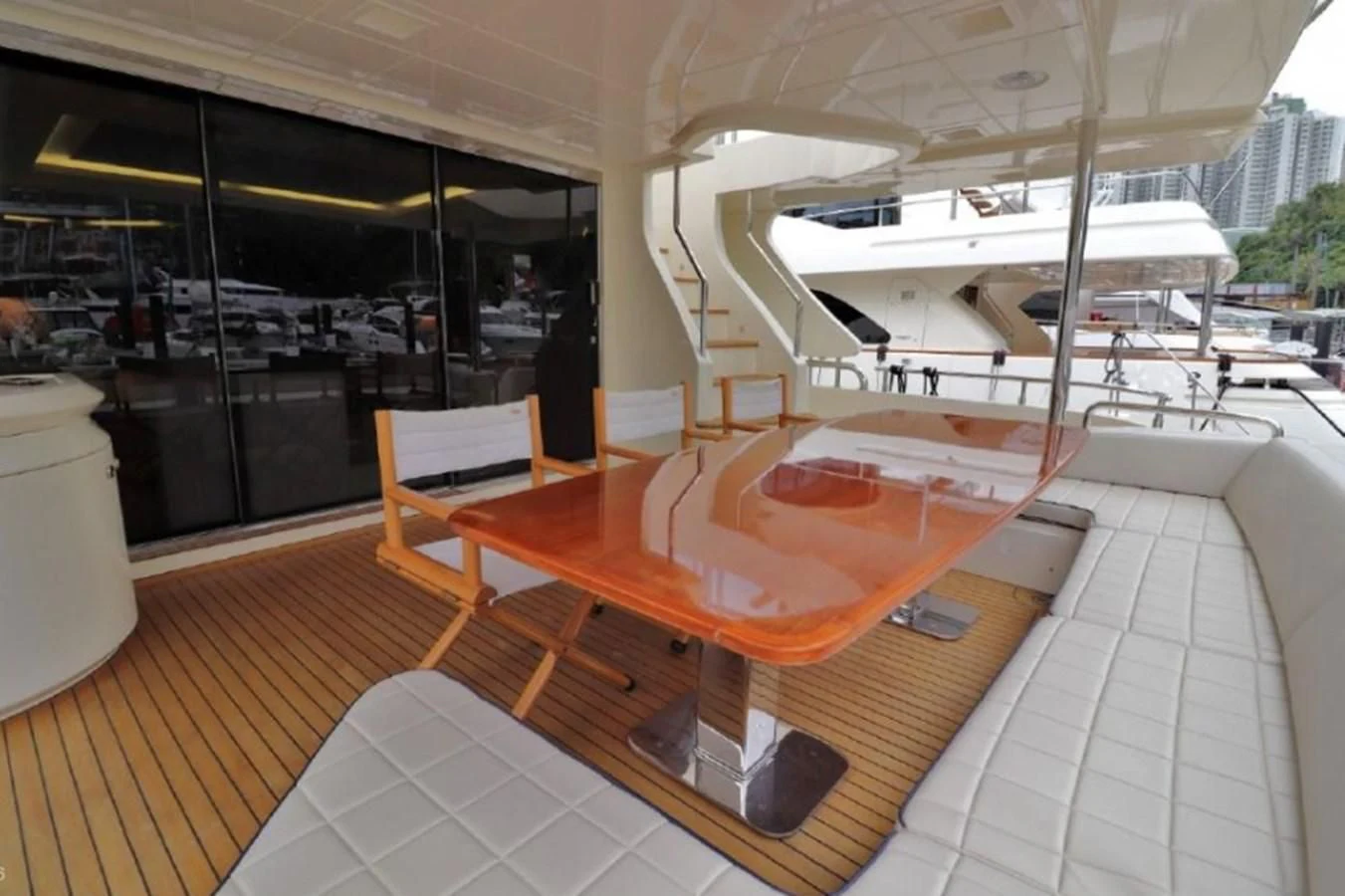 a room with a table and chairs aboard AZIMUT AZ 85/124 Yacht for Sale
