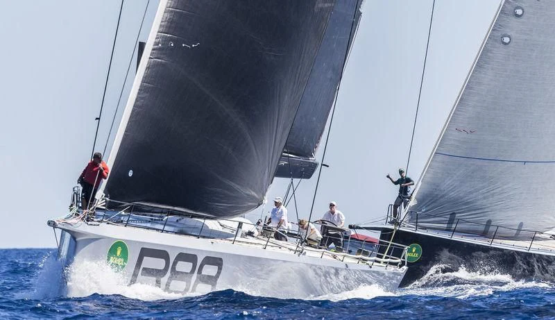 a group of people sailing on a sailboat aboard LUCKY Yacht for Sale