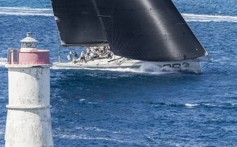 a lighthouse on a snowy day aboard LUCKY Yacht for Sale