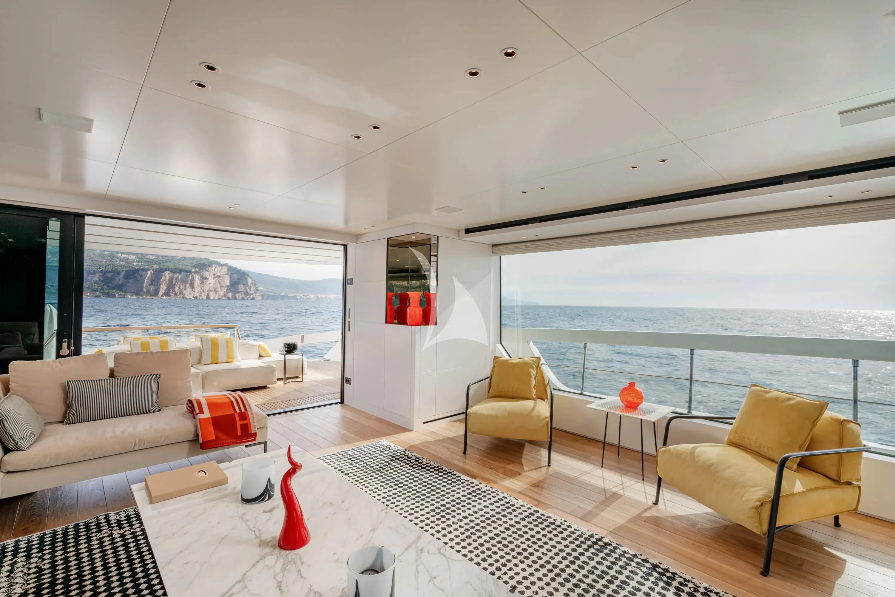 a living room with a large window aboard DANIDA Yacht for Charter
