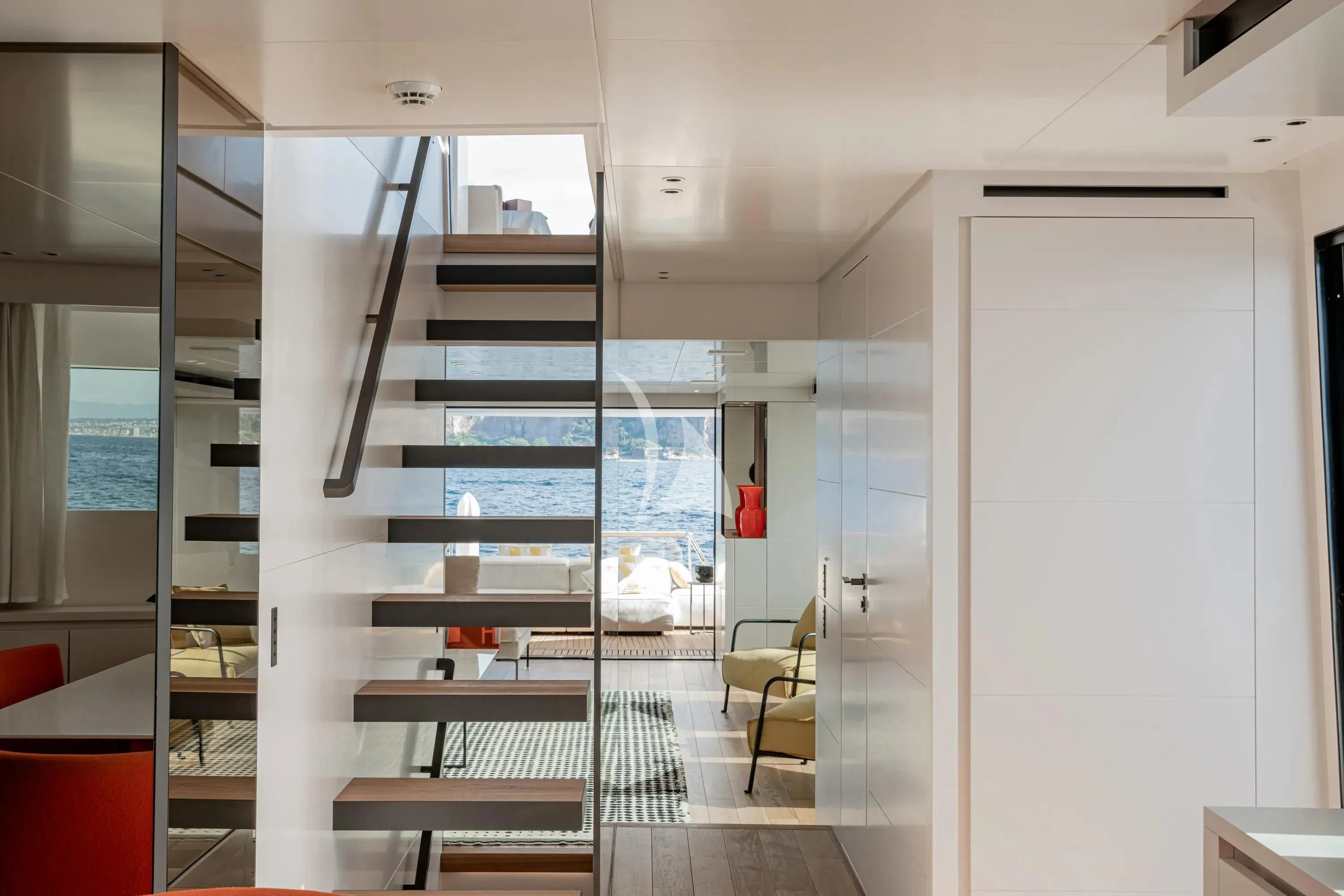 a room with a set of shelves aboard DANIDA Yacht for Charter