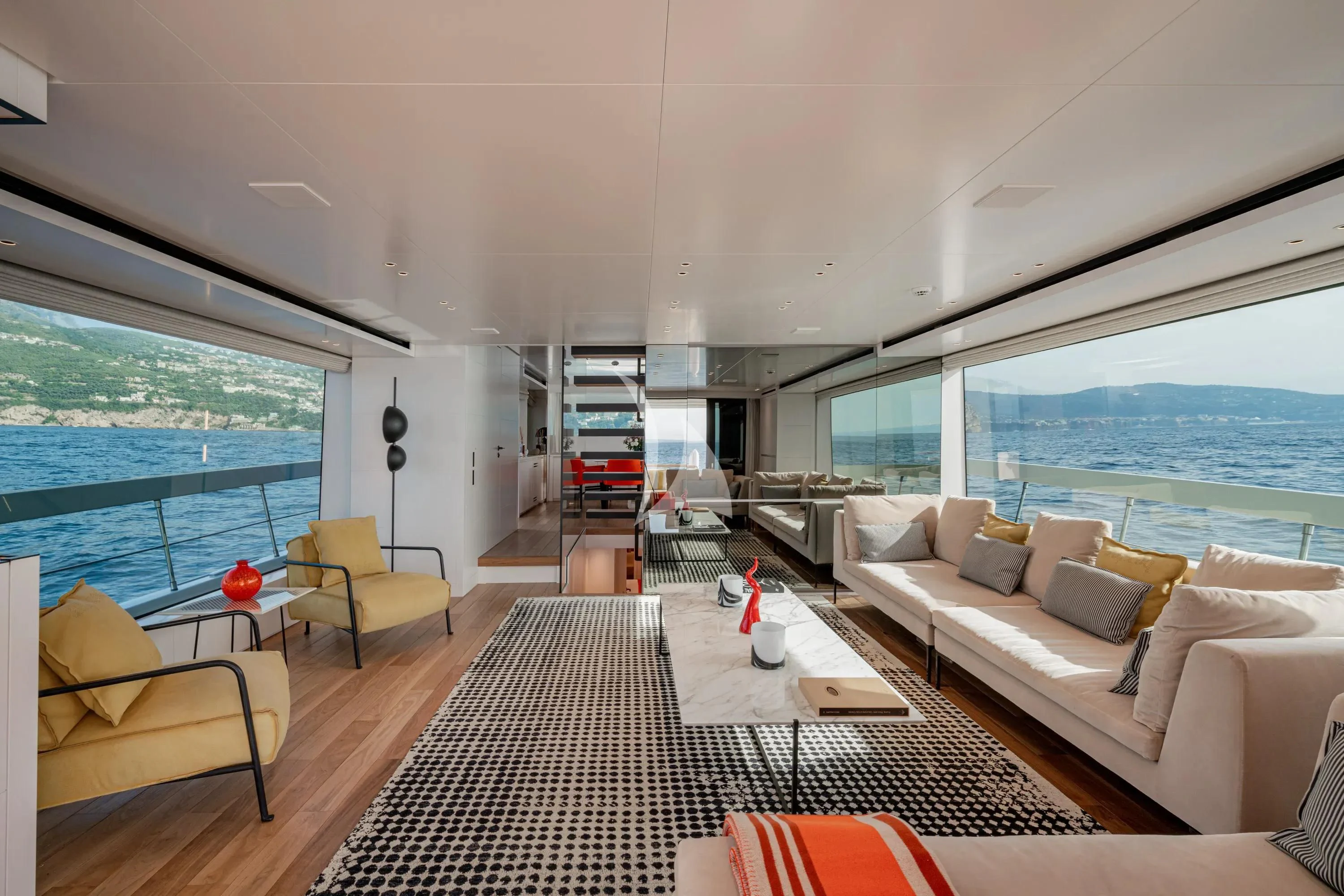 a living room with a large window aboard DANIDA Yacht for Charter