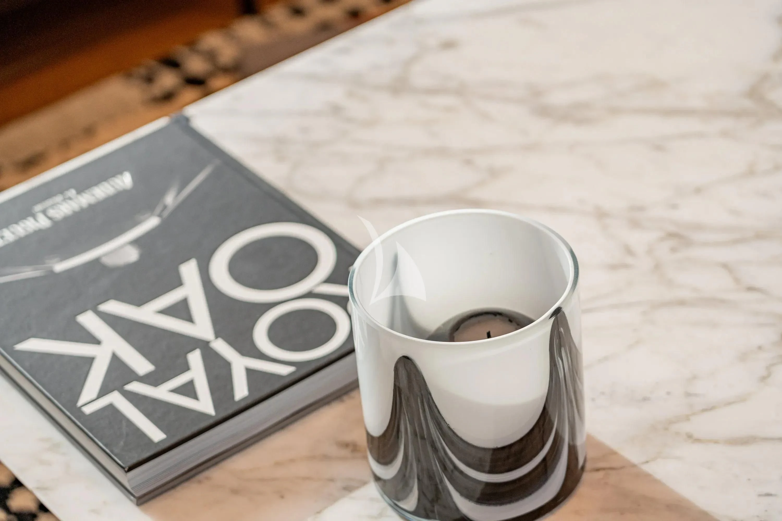 a glass of water on a table aboard DANIDA Yacht for Charter