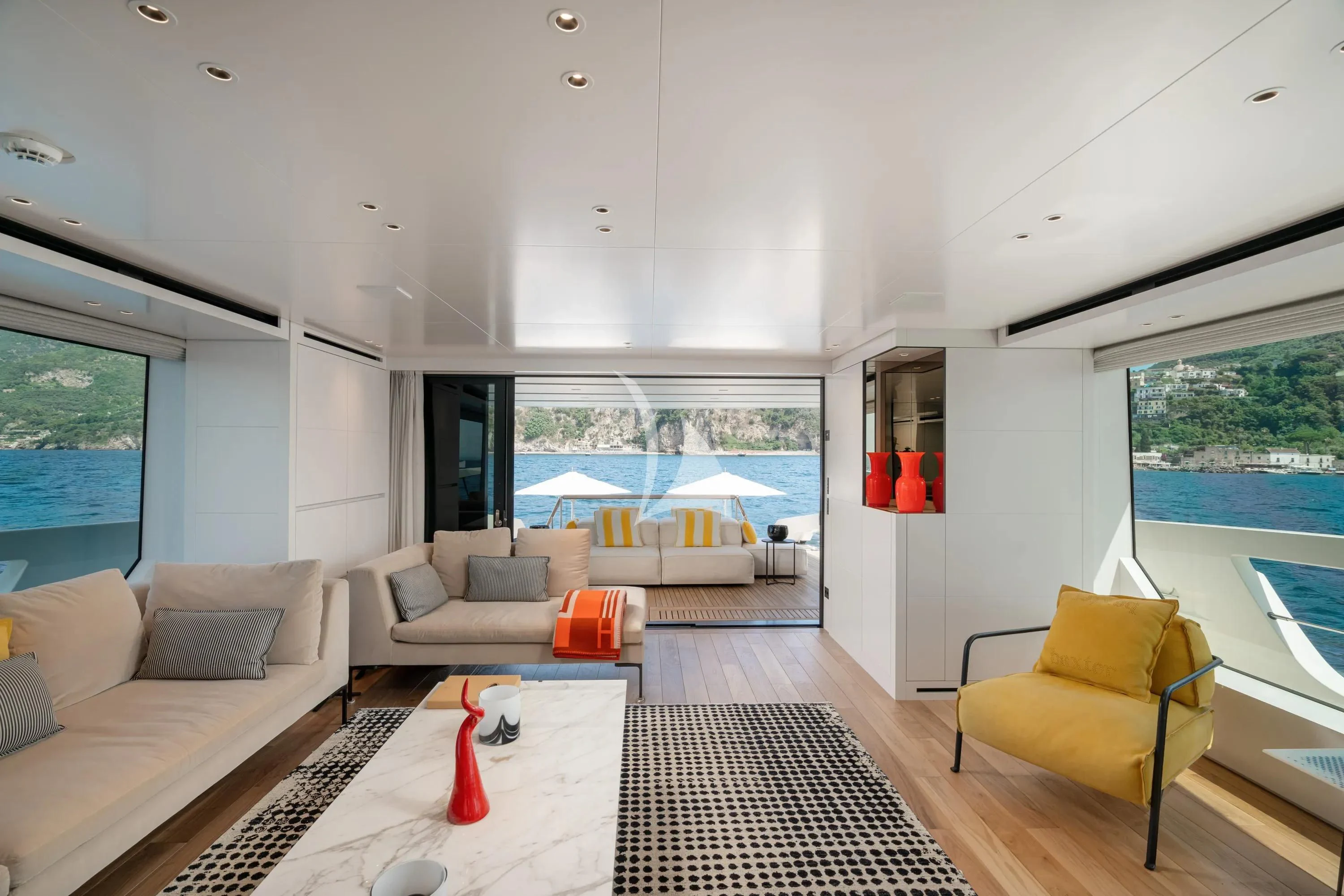 a living room with a large window aboard DANIDA Yacht for Charter
