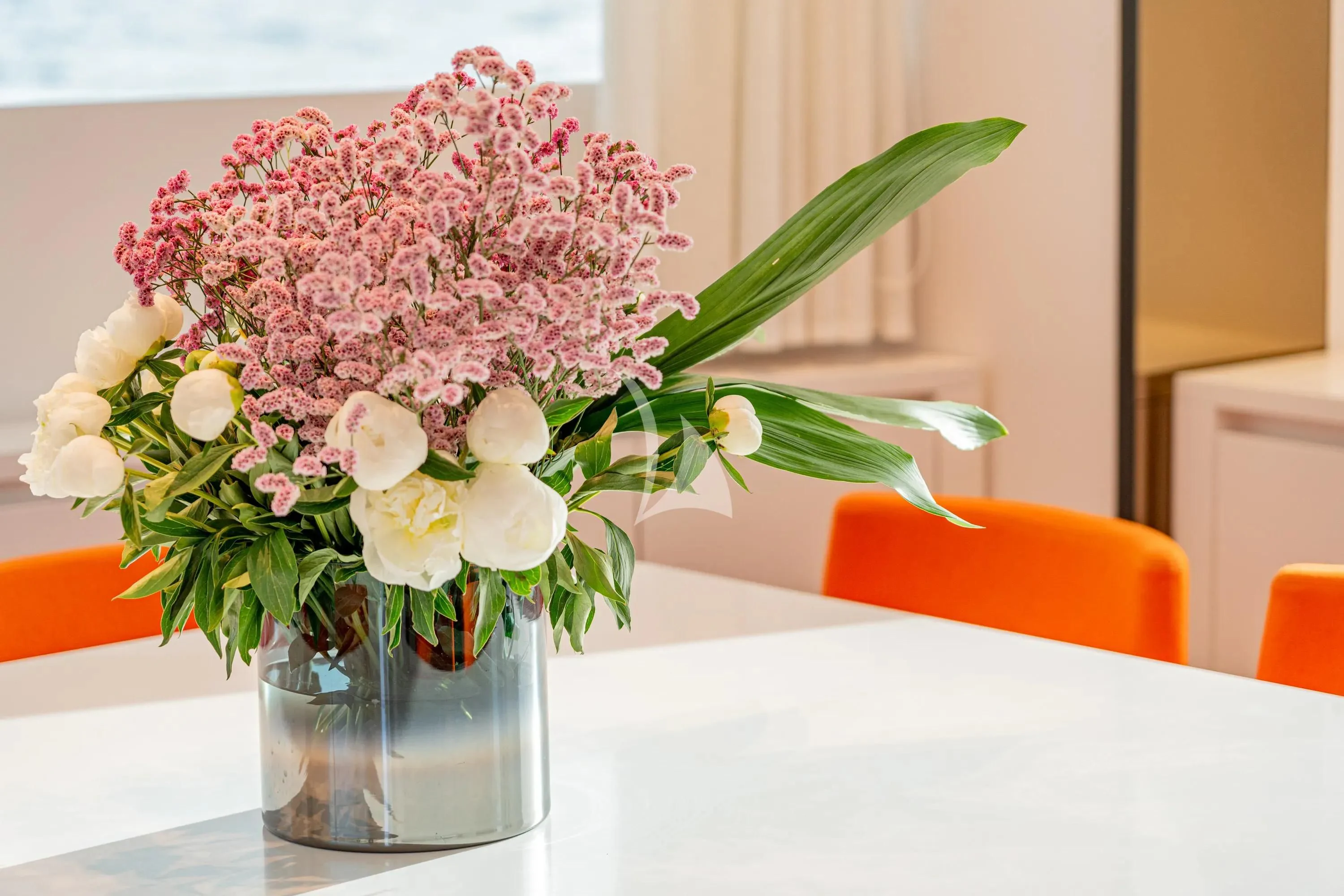 a vase with flowers aboard DANIDA Yacht for Charter