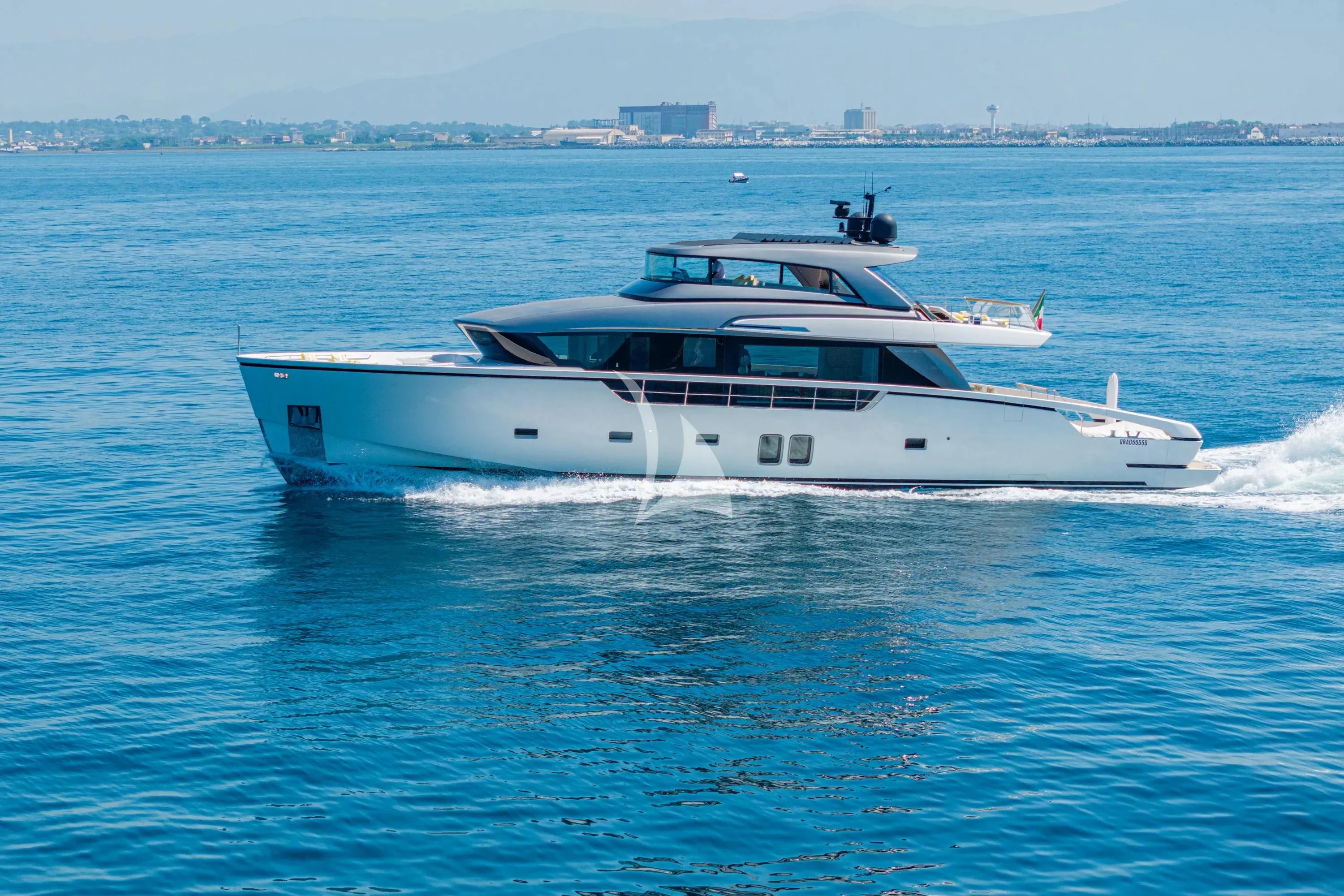 a white yacht in the water aboard DANIDA Yacht for Charter