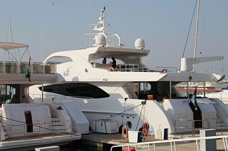 a boat docked at a pier aboard AL SHMOOKH Yacht for Sale
