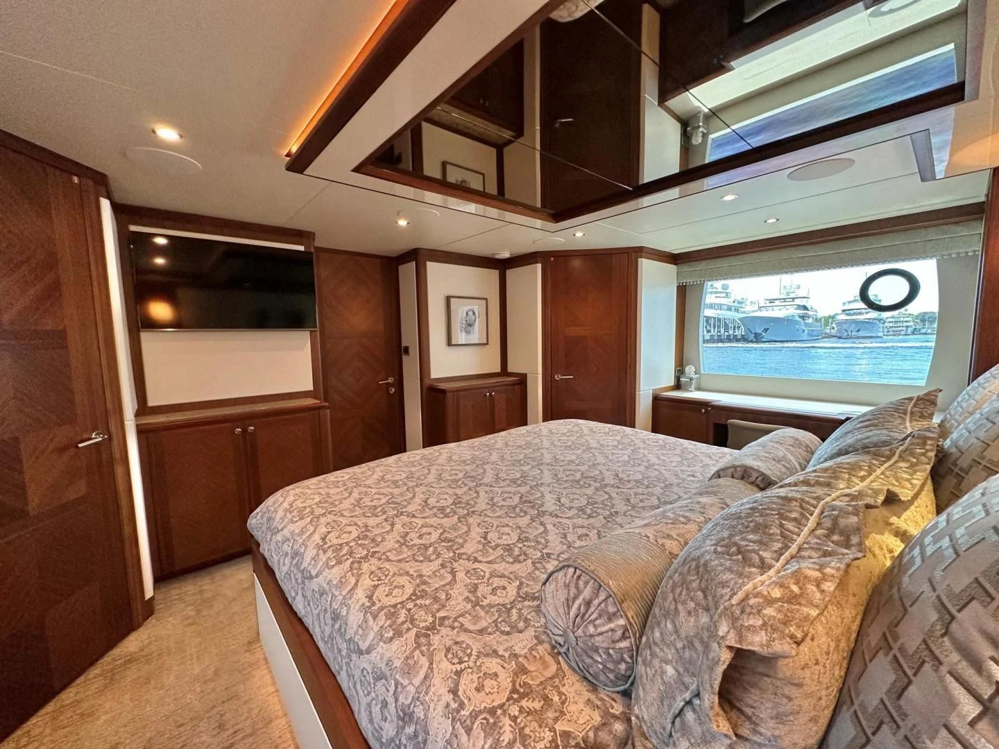 a bed in a room aboard CRUMDALE Yacht for Sale
