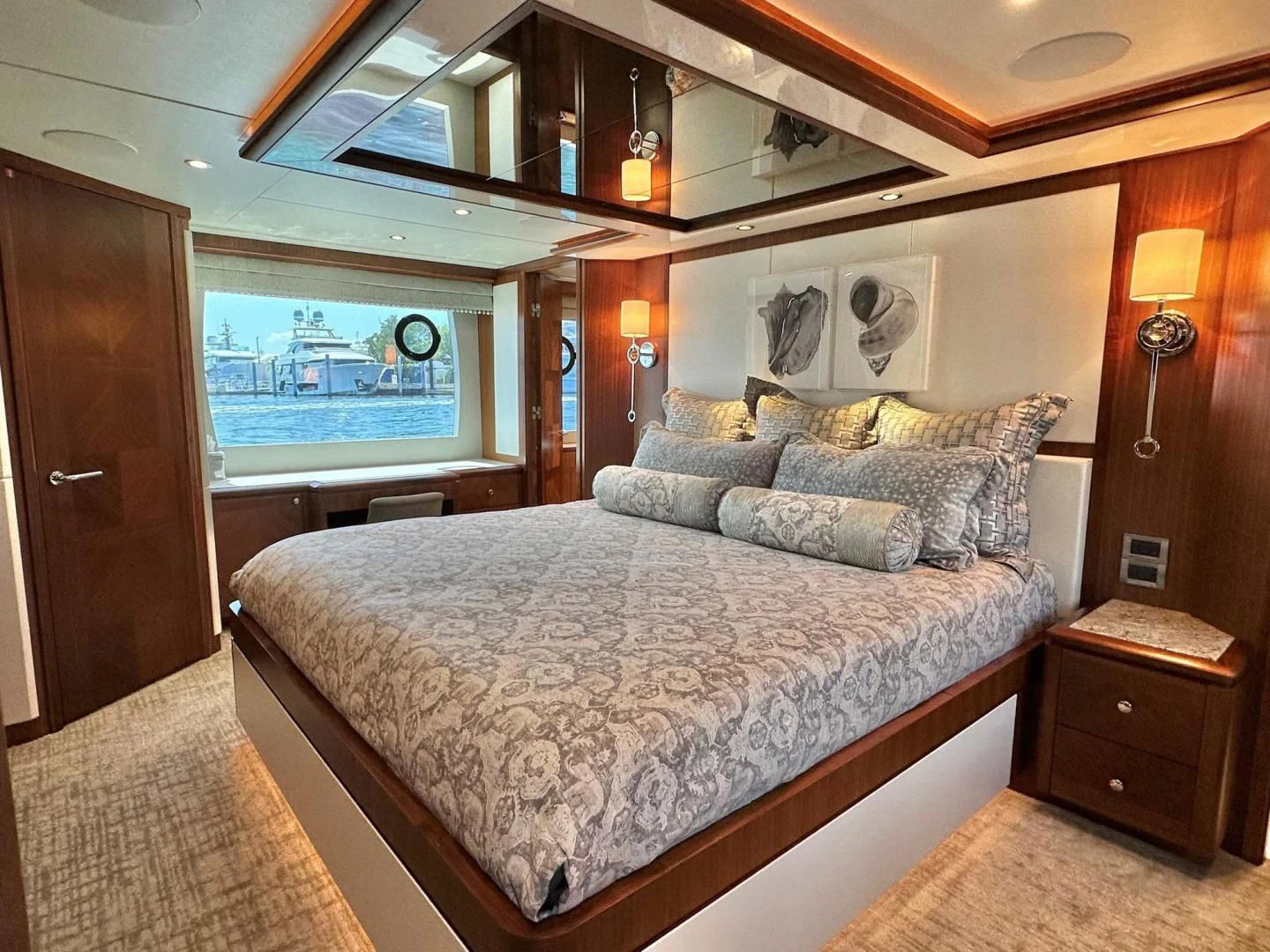 a bed in a room aboard CRUMDALE Yacht for Sale