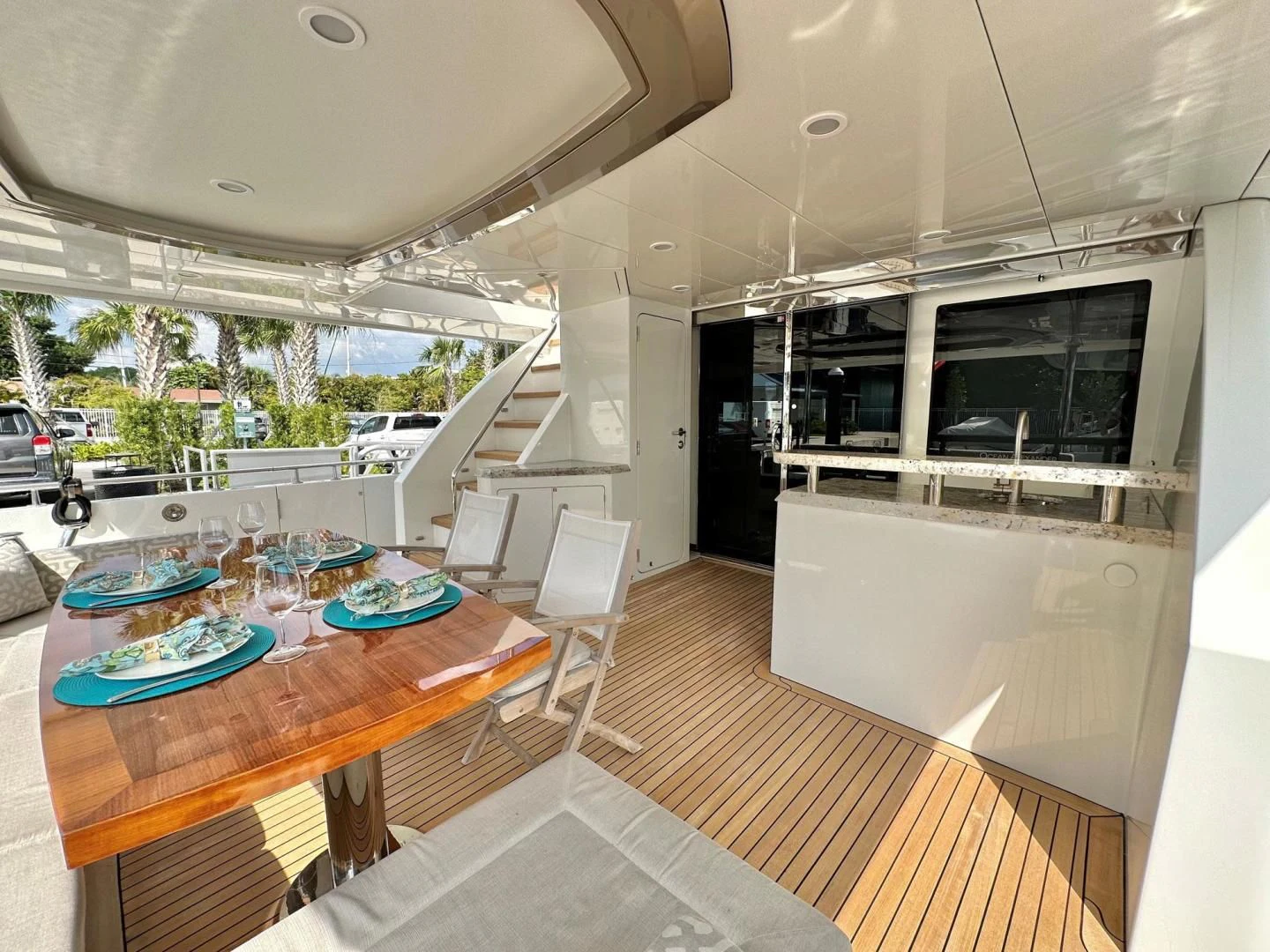 a table and chairs in a room aboard CRUMDALE Yacht for Sale