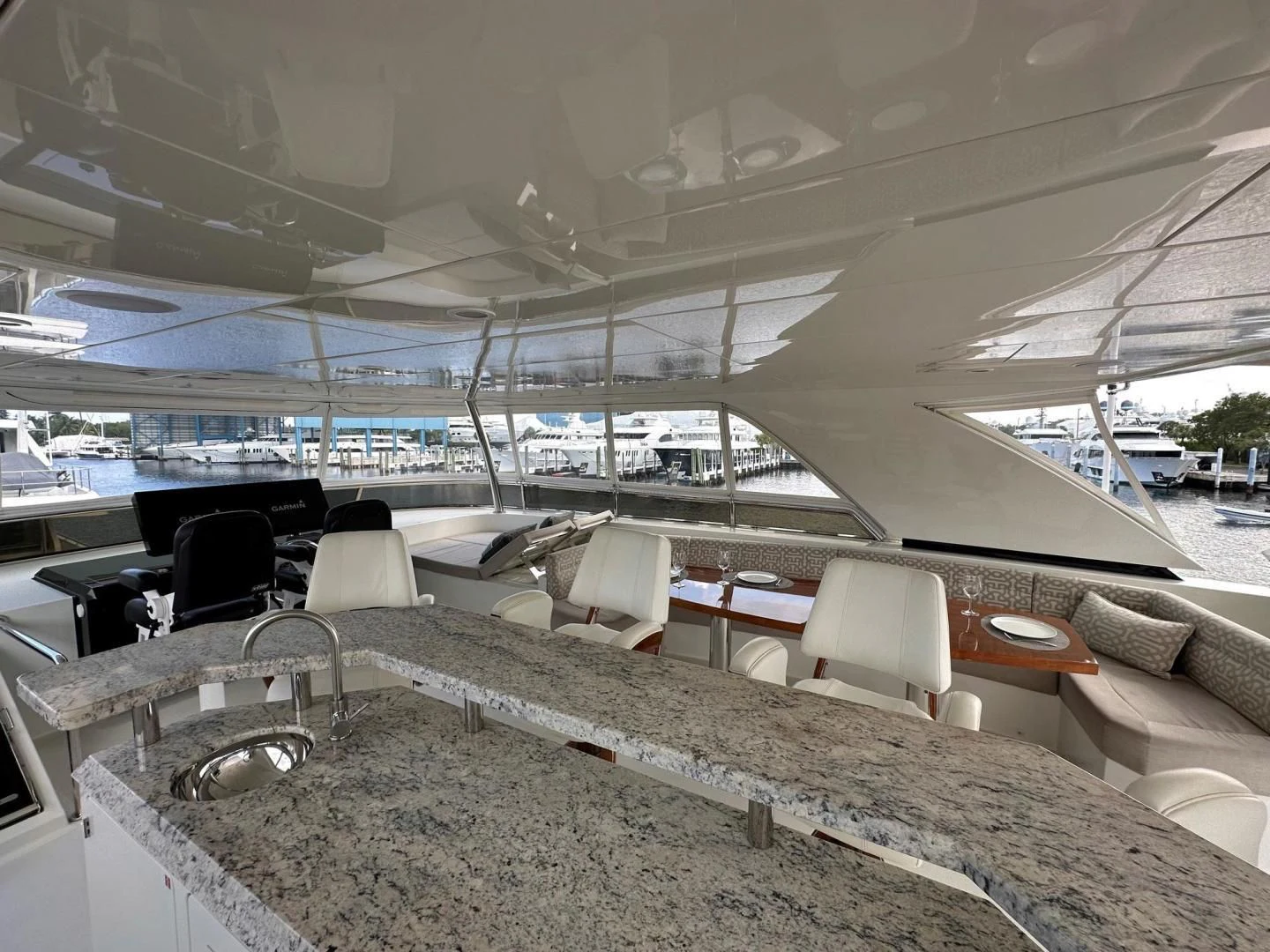 a large room with a large glass ceiling and a large pool table aboard CRUMDALE Yacht for Sale