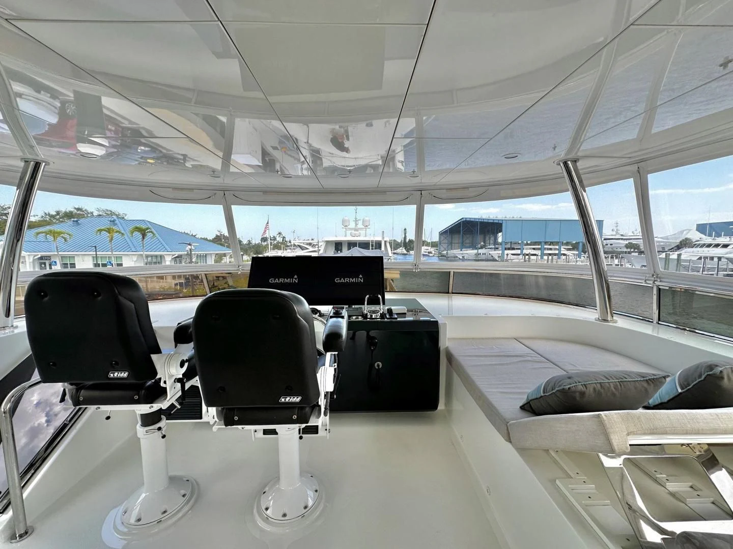 a room with chairs and a table aboard CRUMDALE Yacht for Sale