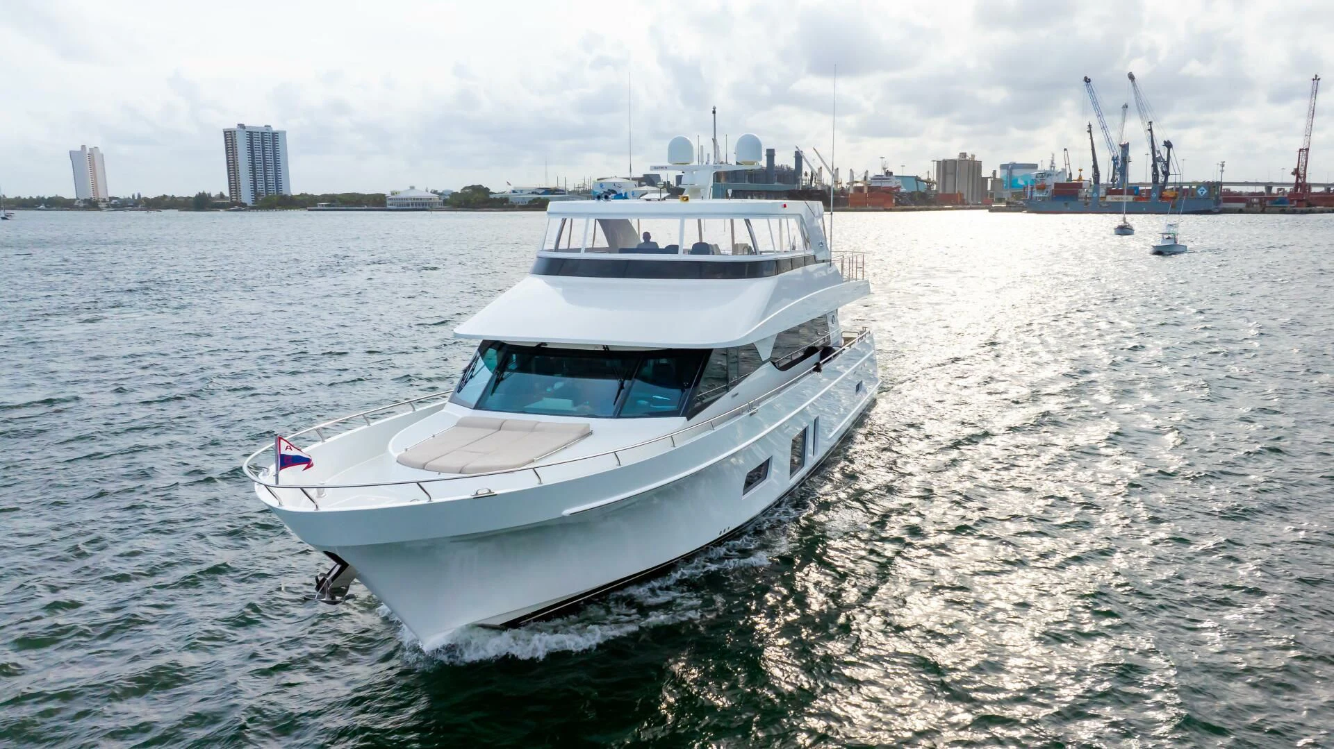 a white boat in the water aboard CRUMDALE Yacht for Sale