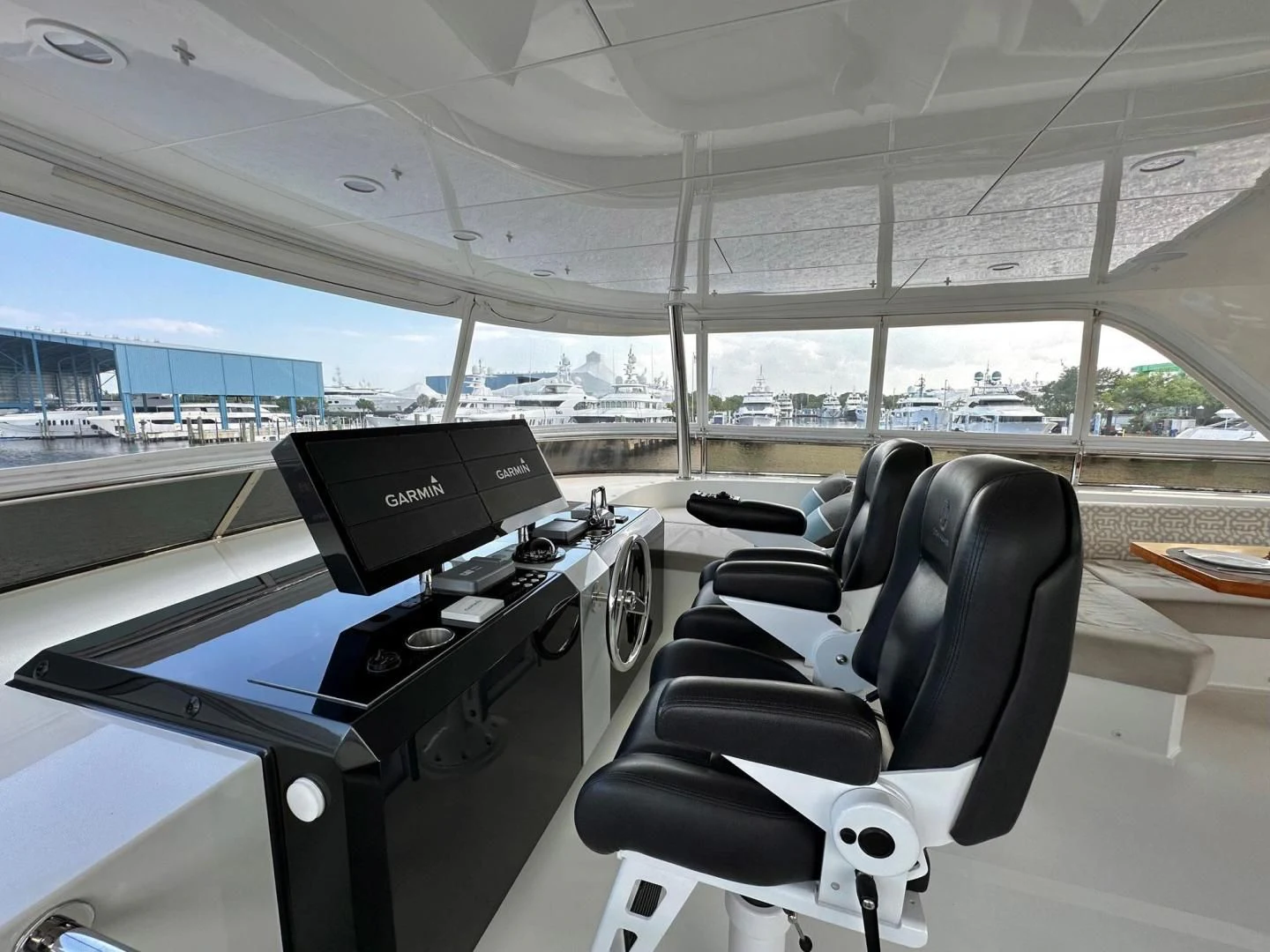 inside of a vehicle with a large window and a view of the city aboard CRUMDALE Yacht for Sale