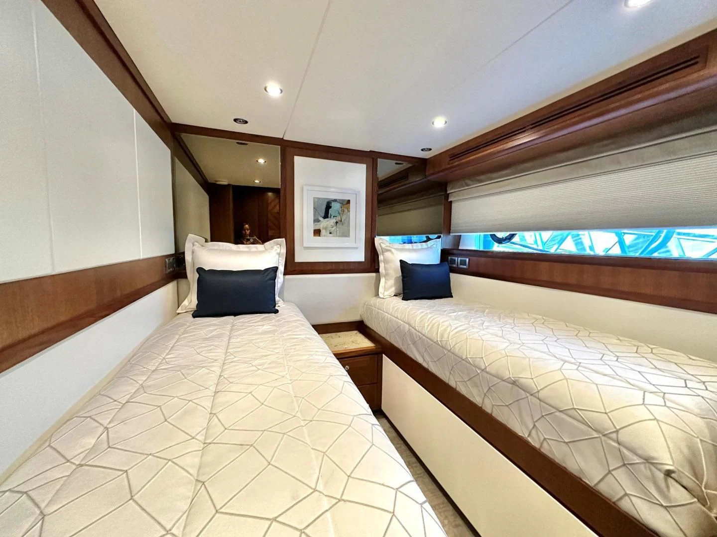 a room with two beds aboard CRUMDALE Yacht for Sale