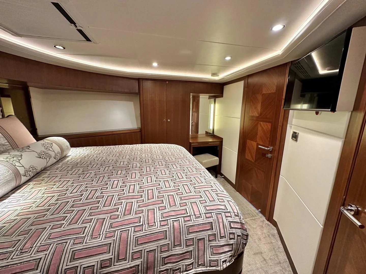 a bedroom with a bed aboard CRUMDALE Yacht for Sale