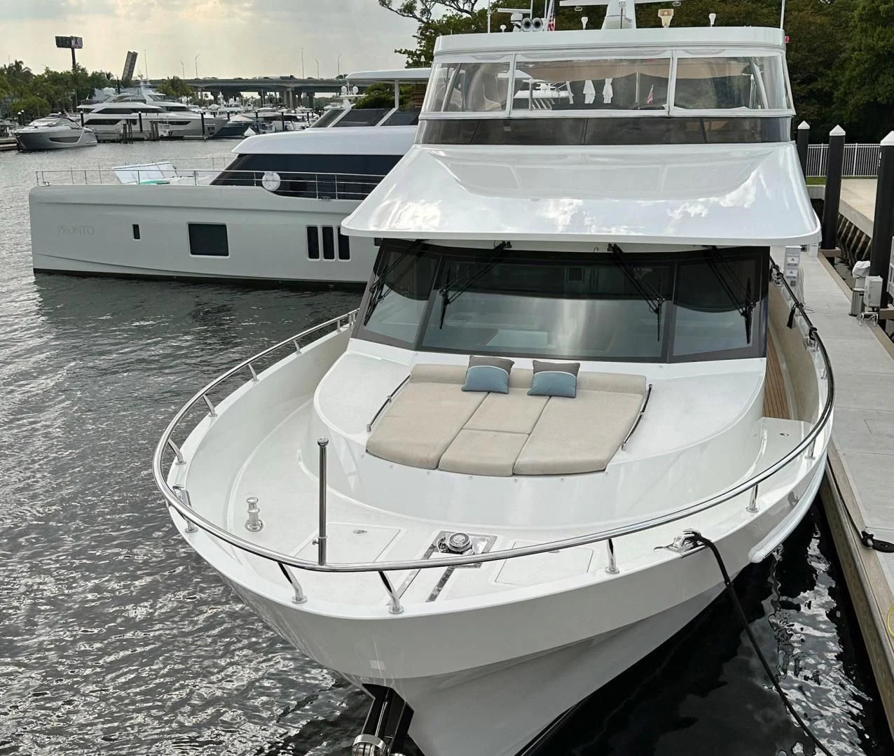 a boat parked on the side of a river aboard CRUMDALE Yacht for Sale