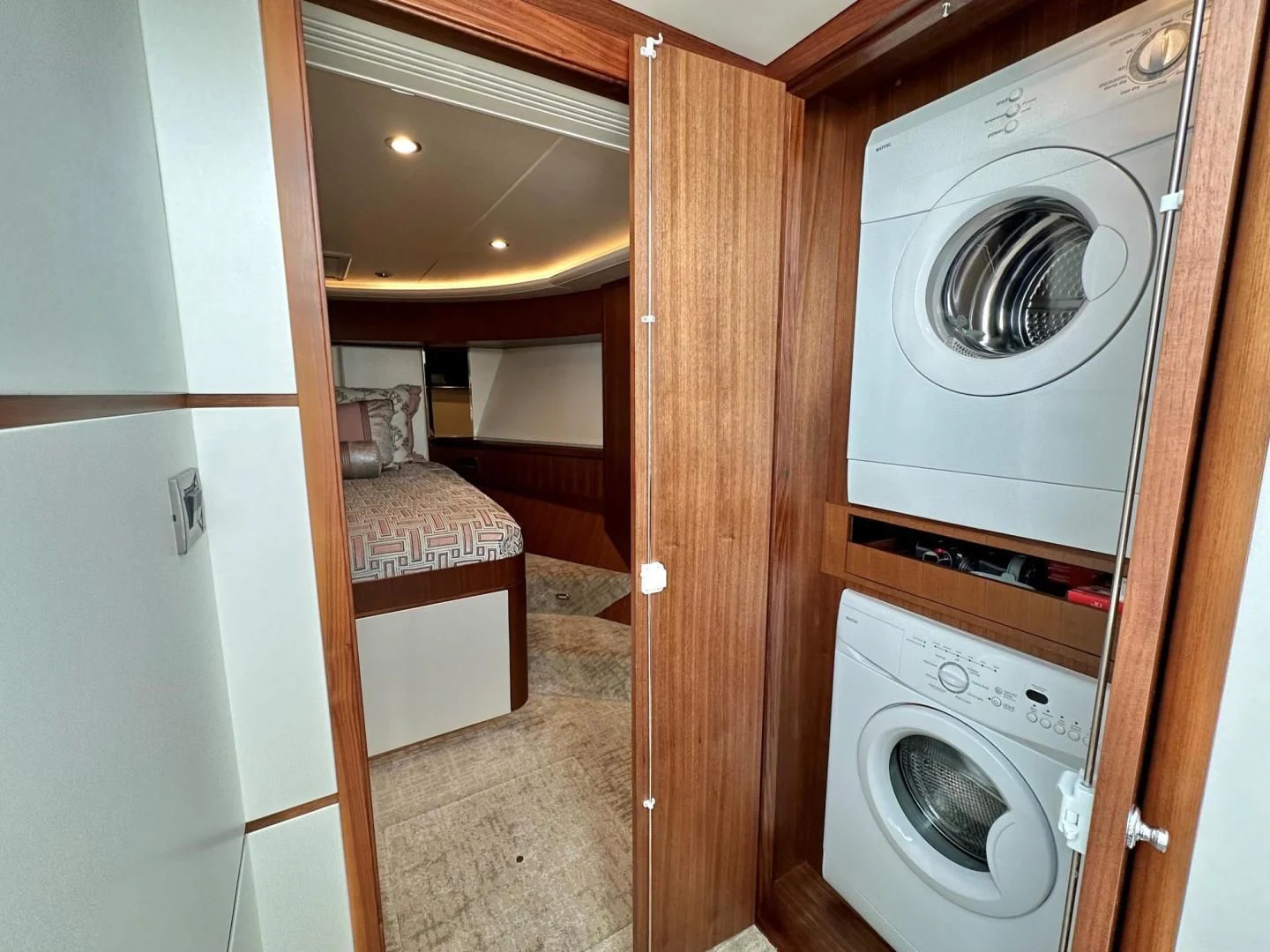 a small room with a washing machine aboard CRUMDALE Yacht for Sale