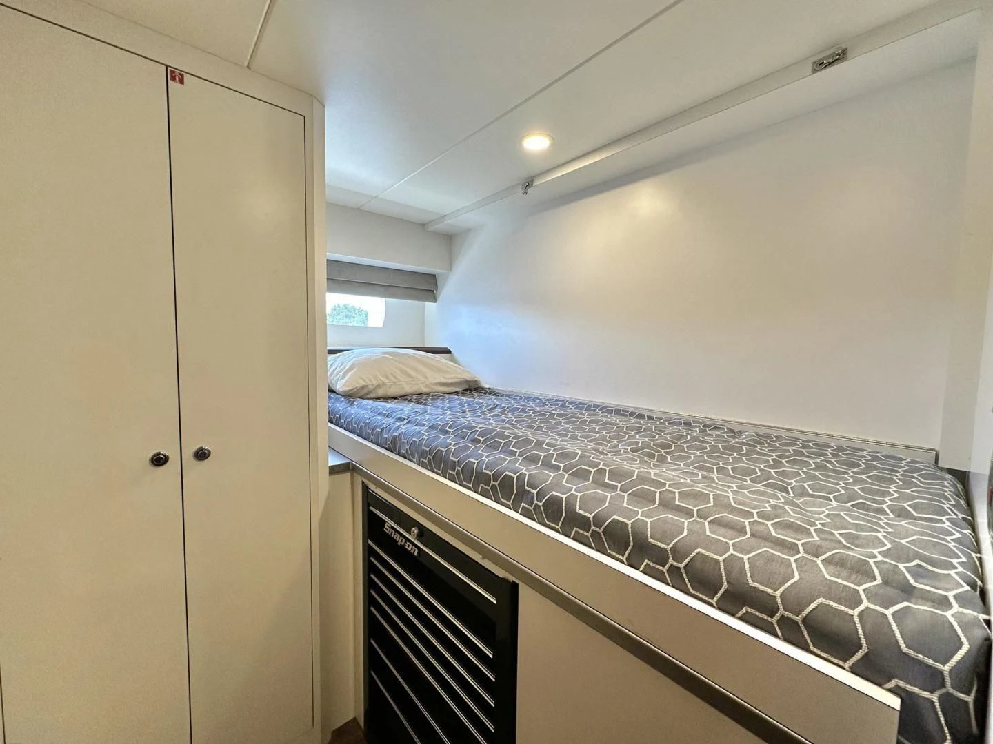 a bed in a room aboard CRUMDALE Yacht for Sale