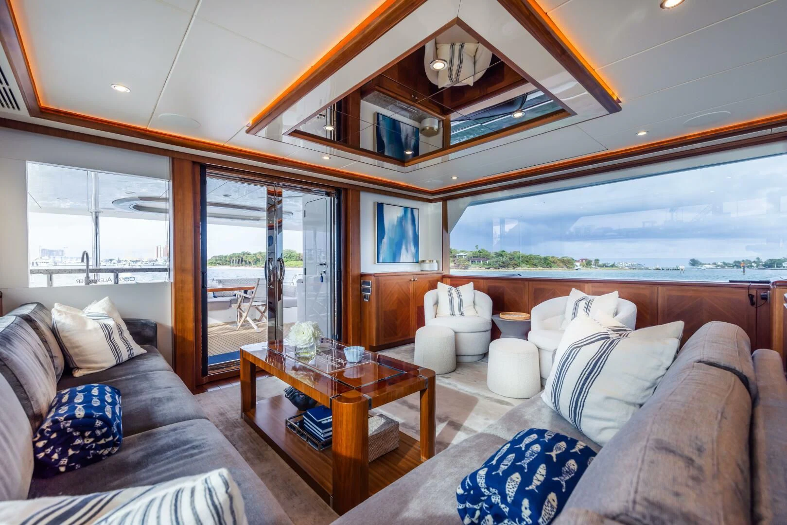 a living room with a large window aboard CRUMDALE Yacht for Sale