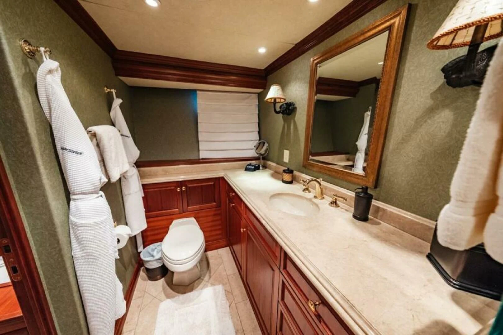a bathroom with a large countertop aboard LEGACY Yacht for Sale