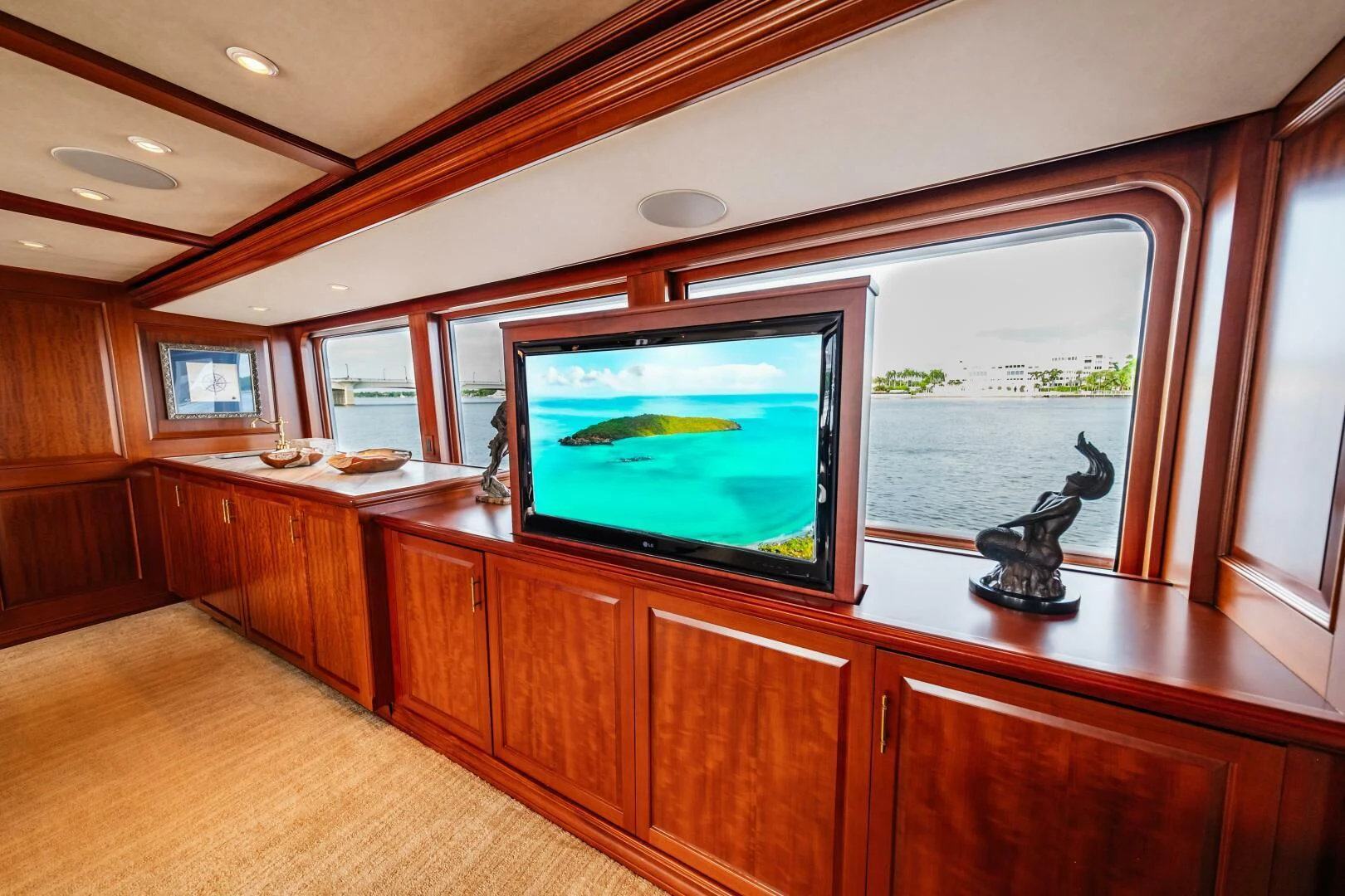 a tv on a counter aboard LEGACY Yacht for Sale