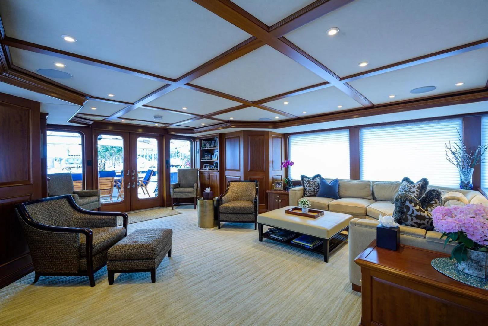 a living room with a large window aboard LEGACY Yacht for Sale
