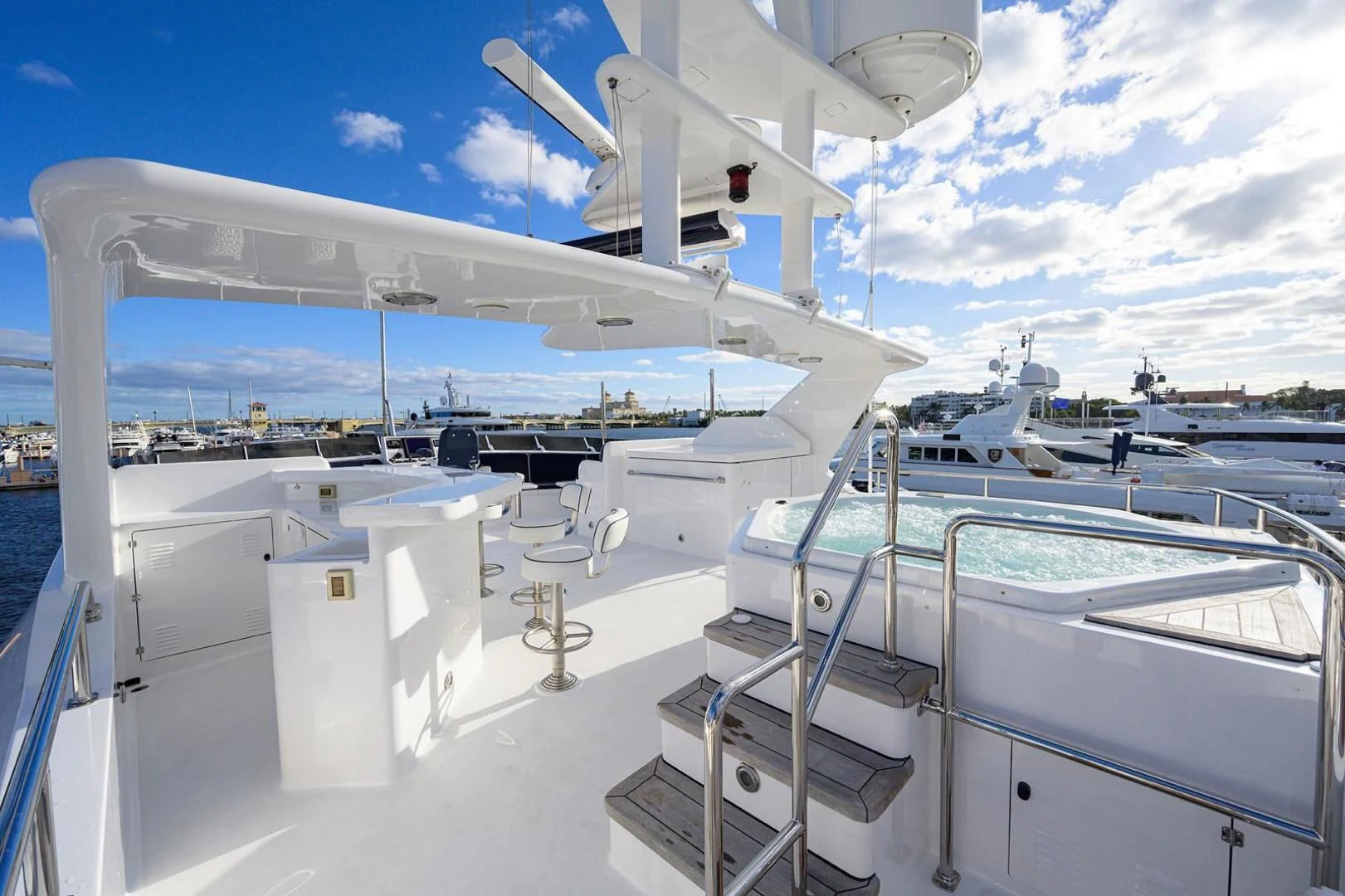 a large white boat with a white deck and a white railing aboard LEGACY Yacht for Sale