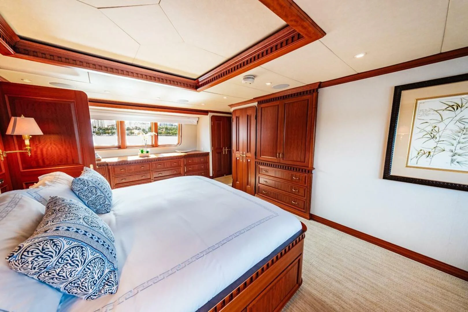 a bedroom with a large bed aboard LEGACY Yacht for Sale